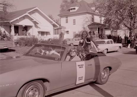 The Northwest High Rise Complex Queen rides in a convertible during the 1973 Homecoming Parade.